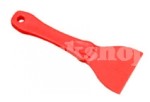 A red plastic spatula with a hole in the middle

Description automatically generated